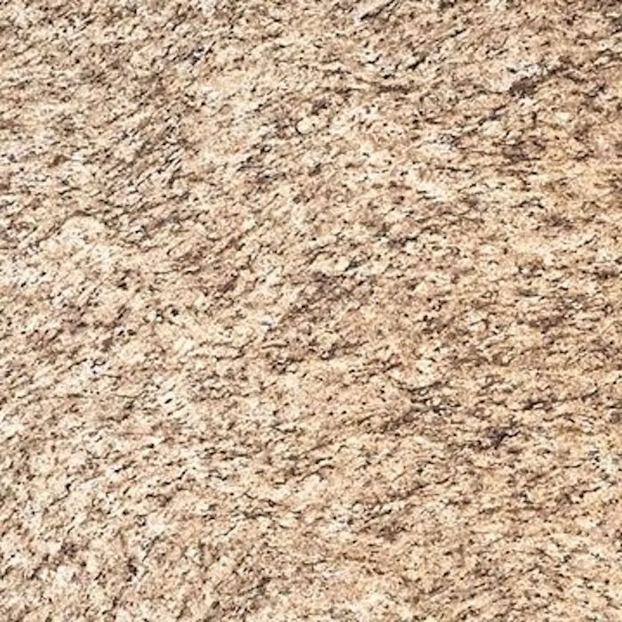 Un primer plano de una encimera de granito marrón.