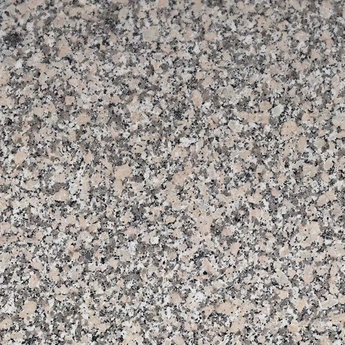 Un primer plano de una encimera de granito que muestra la textura.