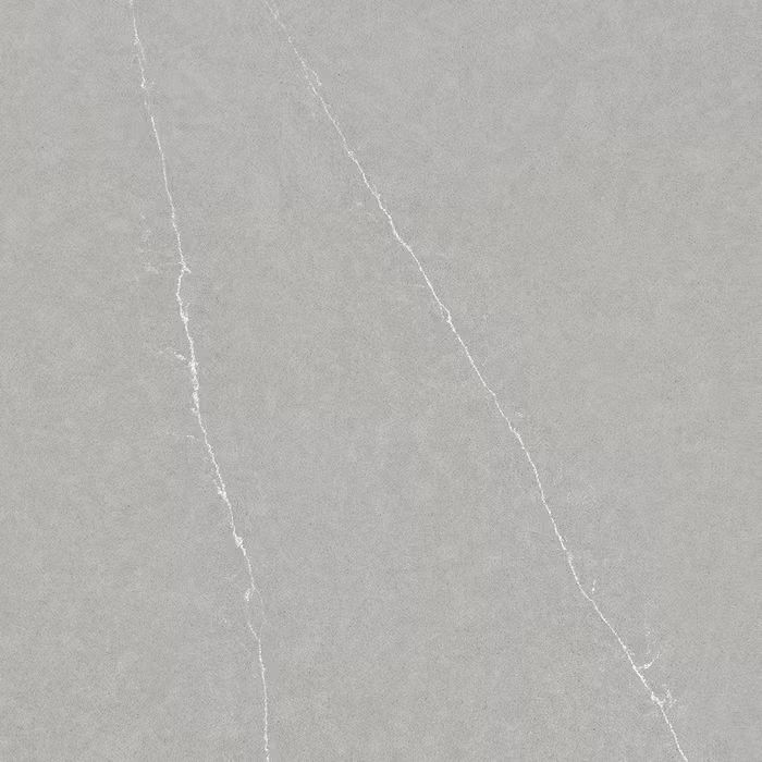 Un primer plano de una textura de mármol gris con vetas blancas.