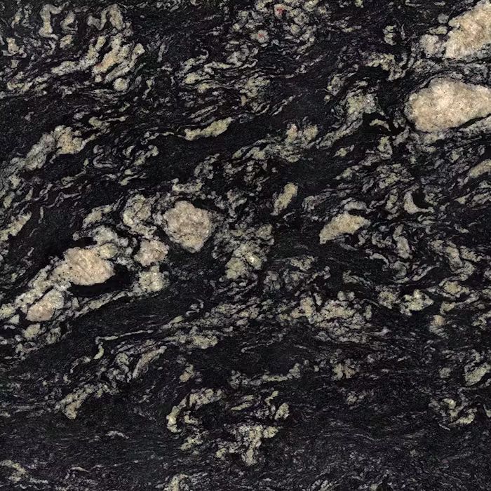 Un primer plano de una encimera de granito negro con manchas blancas
