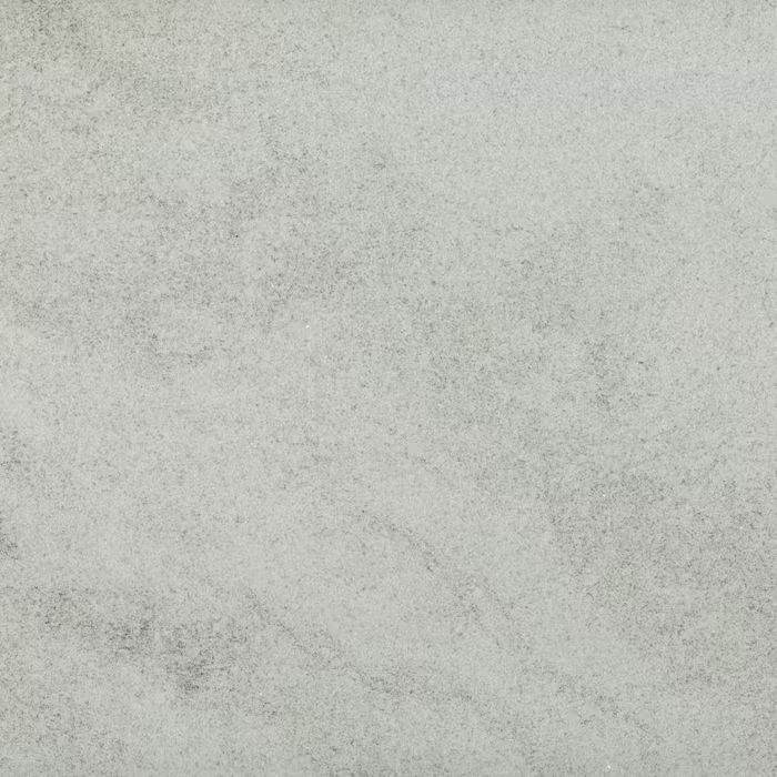 Un primer plano de un azulejo blanco con textura gris.
