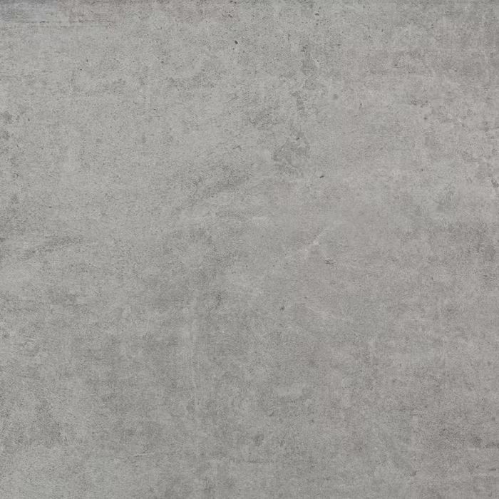 Un primer plano de un azulejo gris con textura de hormigón.