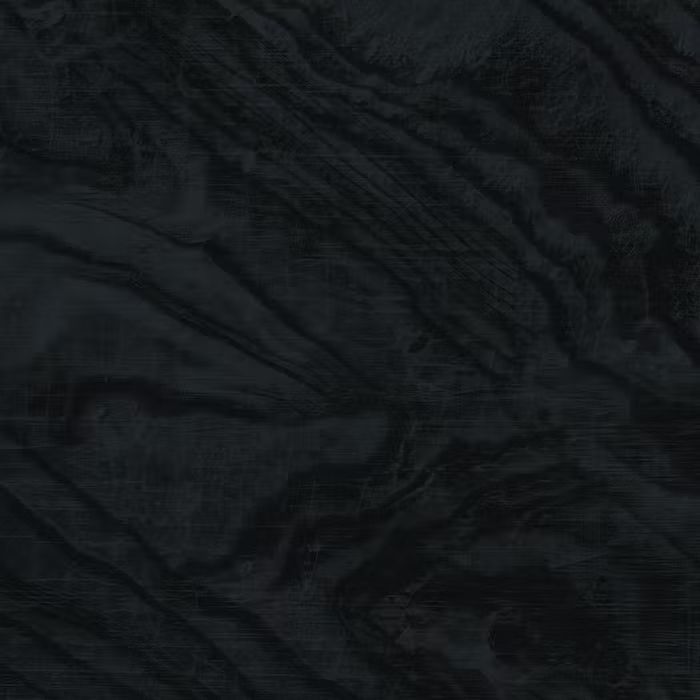 Un primer plano de una tela negra con textura de mármol.