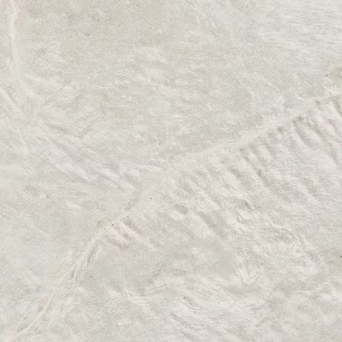 Un primer plano de una textura de mármol blanco.