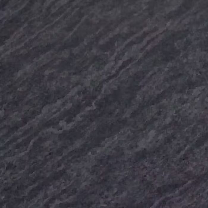Un primer plano de una textura de mármol negro.
