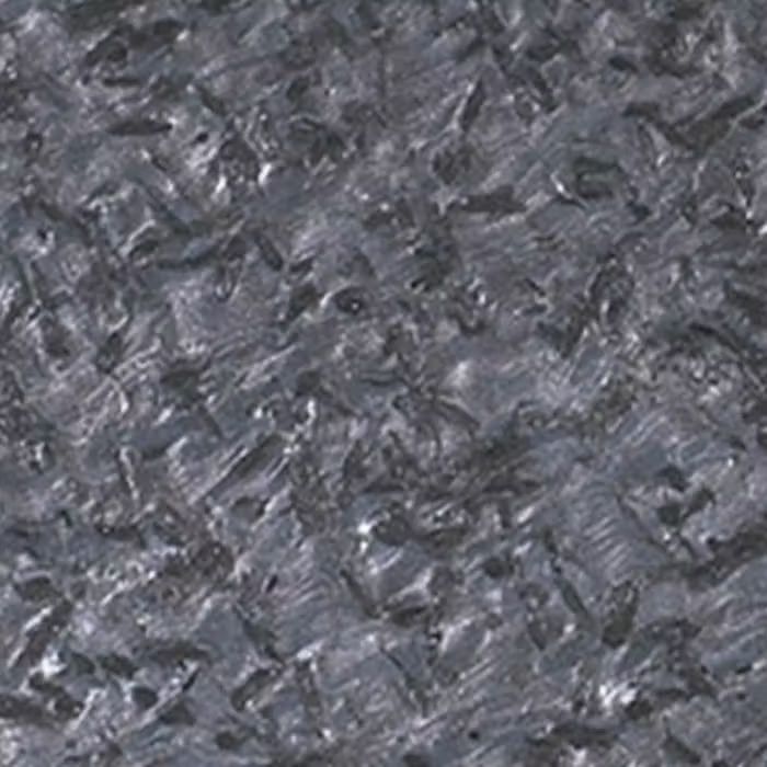 Un primer plano de una superficie gris con textura de mármol.
