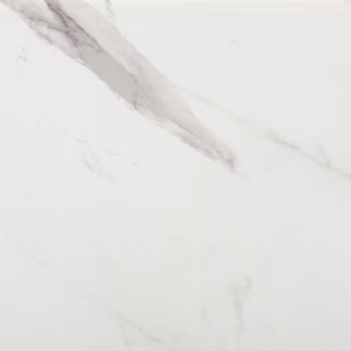 Un primer plano de un azulejo blanco con textura de mármol.