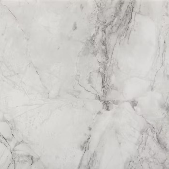 Un primer plano de una encimera de mármol blanco.