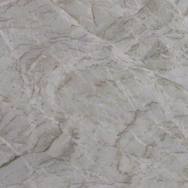 Un primer plano de un suelo de baldosas de mármol blanco.