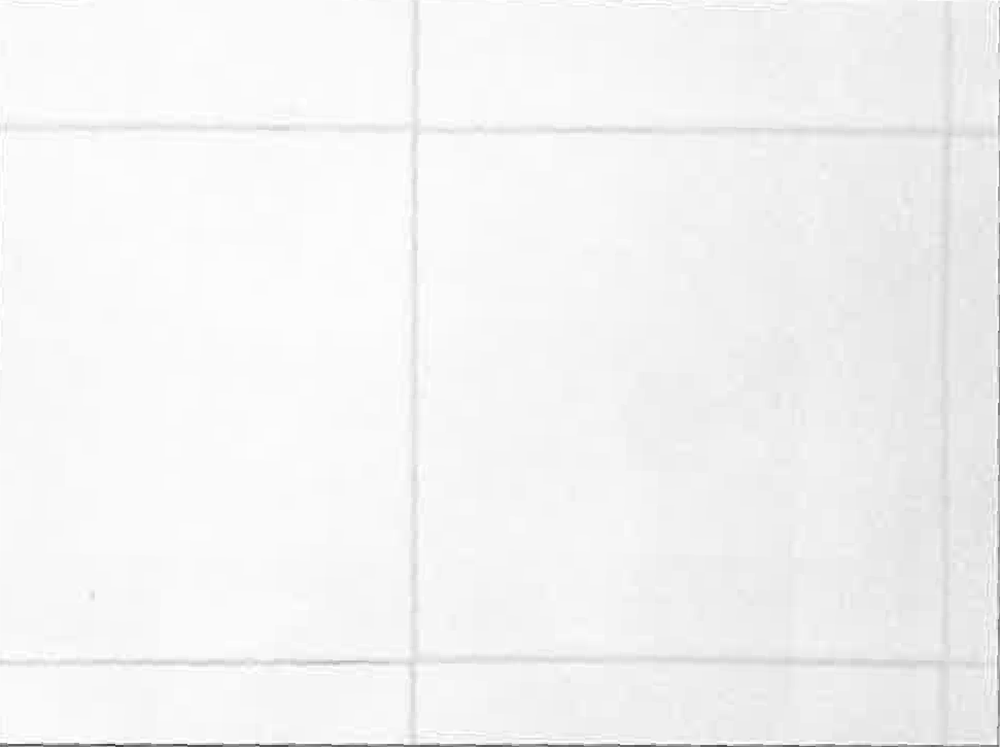 Un primer plano de un suelo de baldosas blancas con un patrón de cuadrícula.