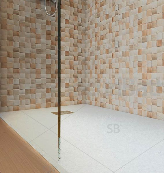 Un baño con pared de azulejos y plato de ducha.