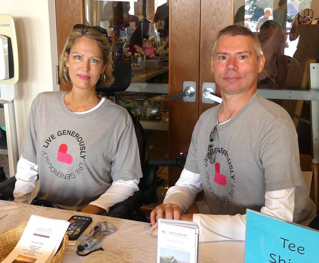 A man and a woman are sitting at a table