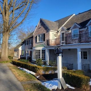 A Row Of Houses On A Sunny Day With Snow On The Ground — Lititz, PA — Trailside Spouting, LLC