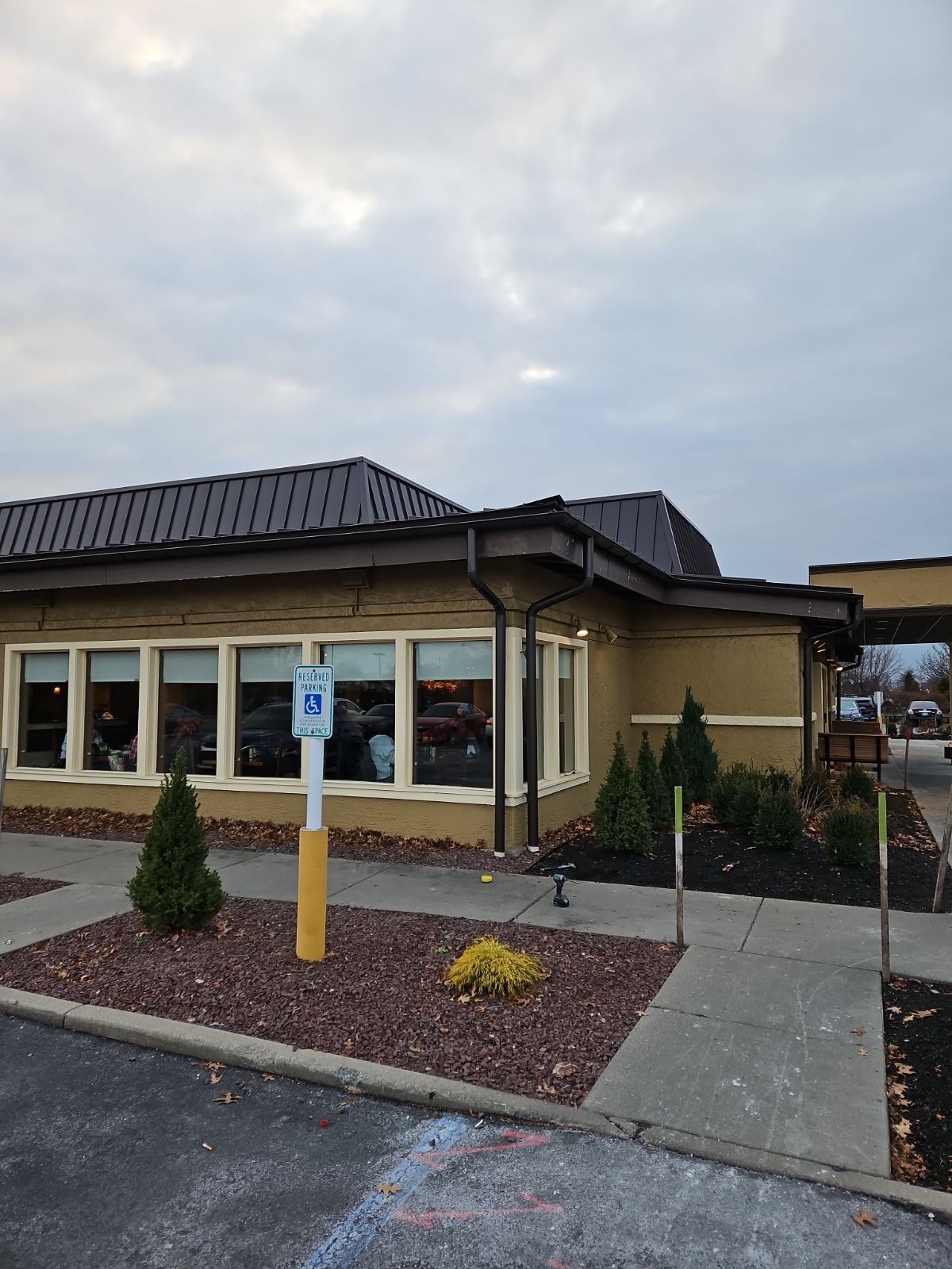 A Building with a Handicapped Parking Sign – Lititz, PA – Trailside Spouting, LLC