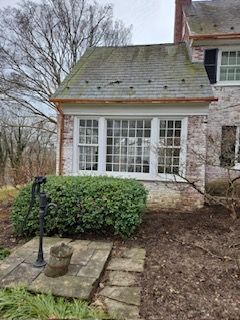 A House With A Large Window And A Copper Gutter On The Roof — Lititz, PA — Trailside Spouting, LLC