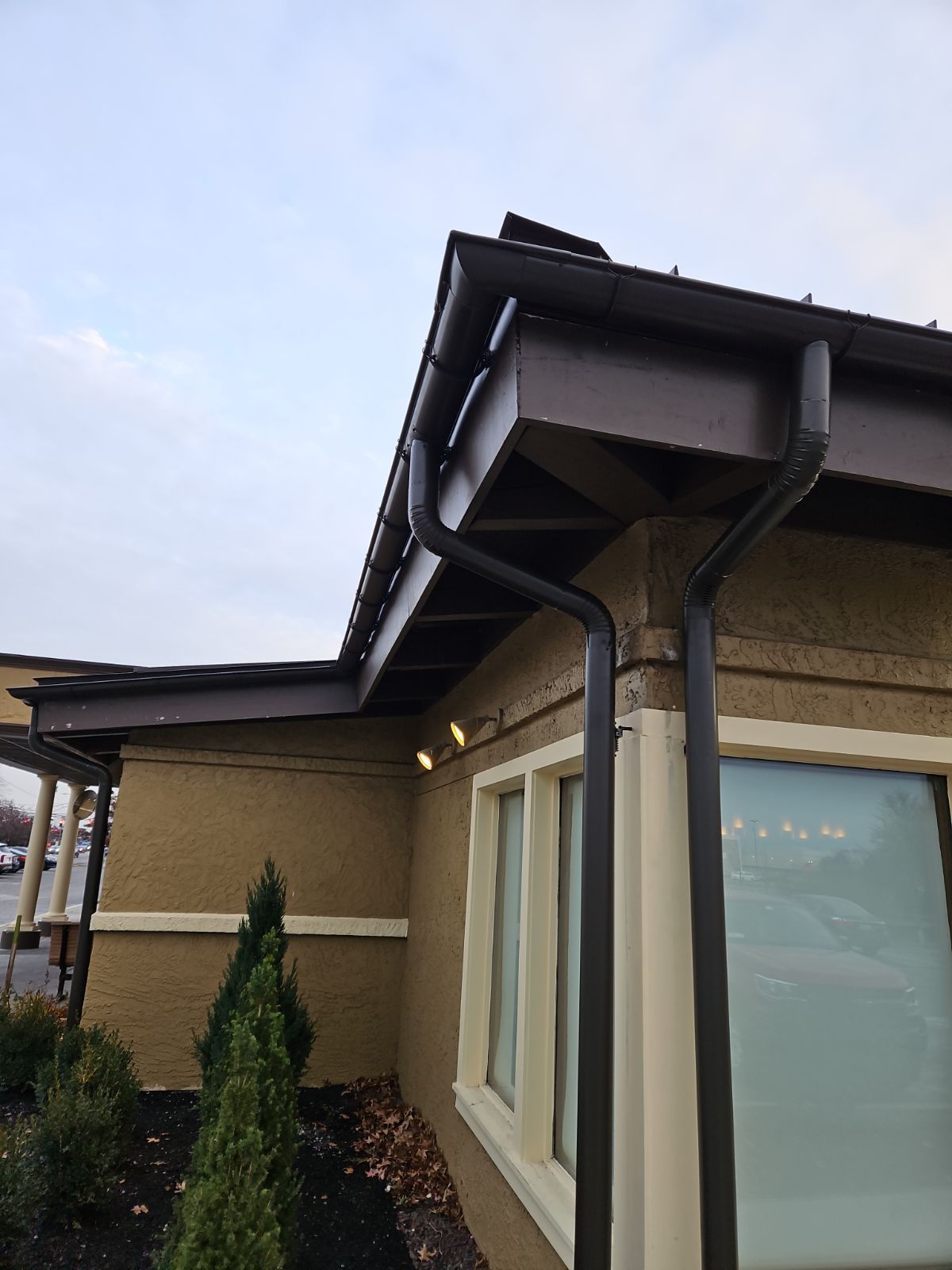 A Building with 2 Gutters on the Side of it – Lititz, PA – Trailside Spouting, LLC