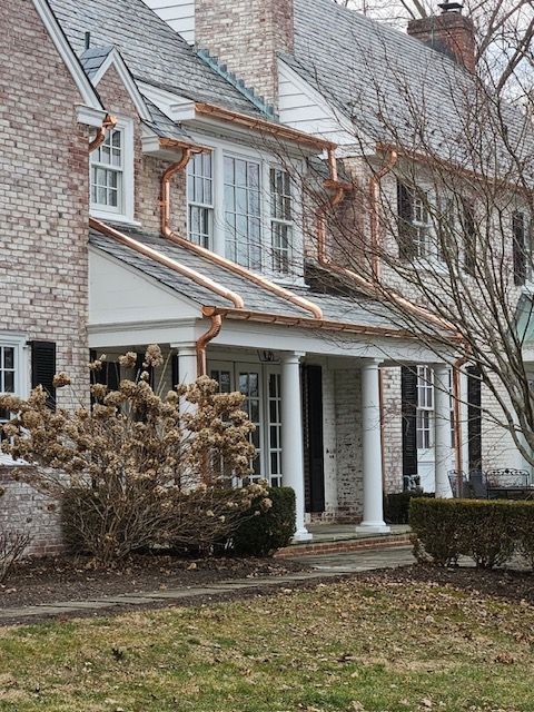Row Of Houses With Copper Gutters And A Porch – Lititz, PA – Trailside Spouting, LLC