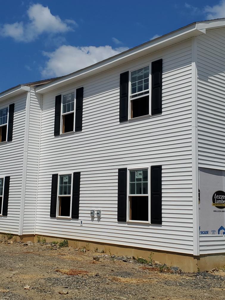 Close Up Of White Houses – Lititz, PA – Trailside Spouting, LLC