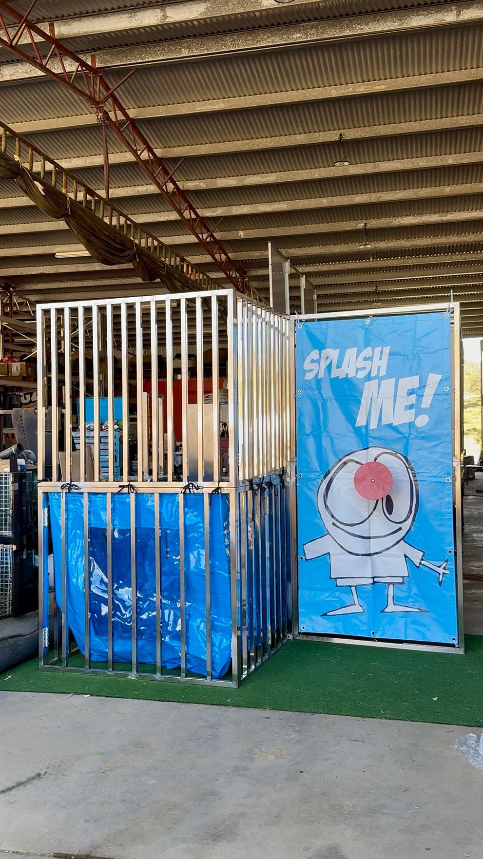 A colorful train is sitting on a track in an amusement park — AMP Amusements In Rockhampton, QLD