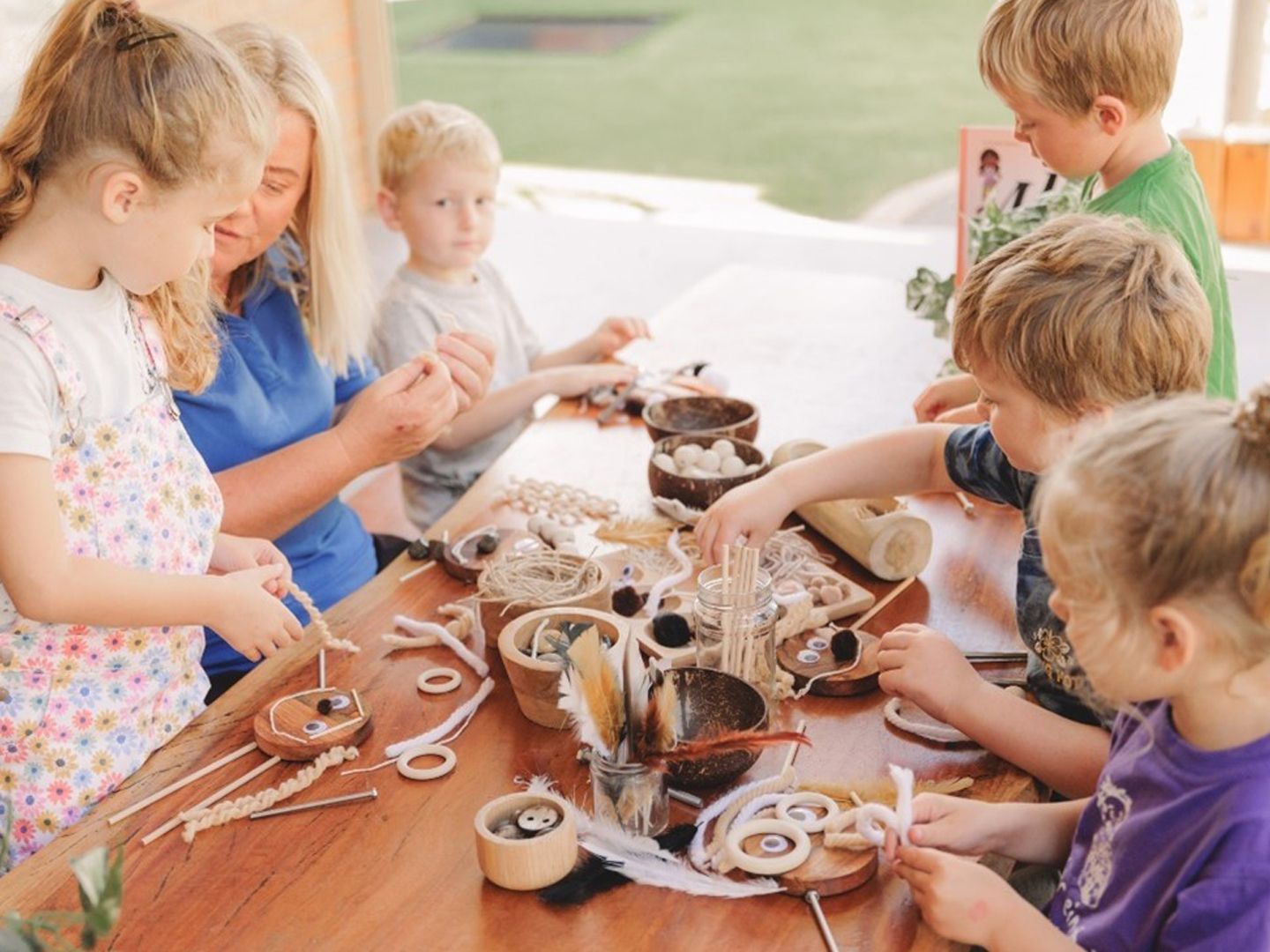 A Group of Children Are Sitting Around a Table Making Crafts  — Shell Heights, NSW — Junior Einstein