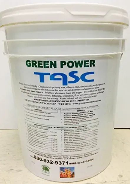 A bucket of green power tasc sits on a table