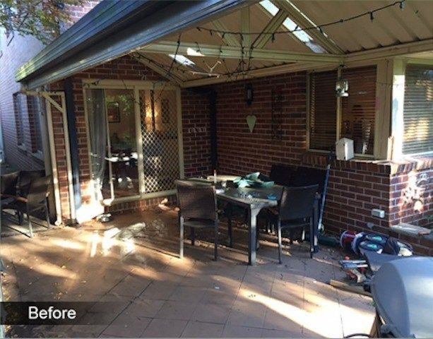 A Before Picture of a Patio With a Table and Chairs — Superior Windows & Doors Taree, NSW