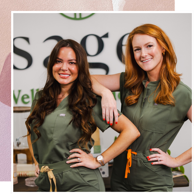 Two women are posing for a picture in front of a sign that says sage