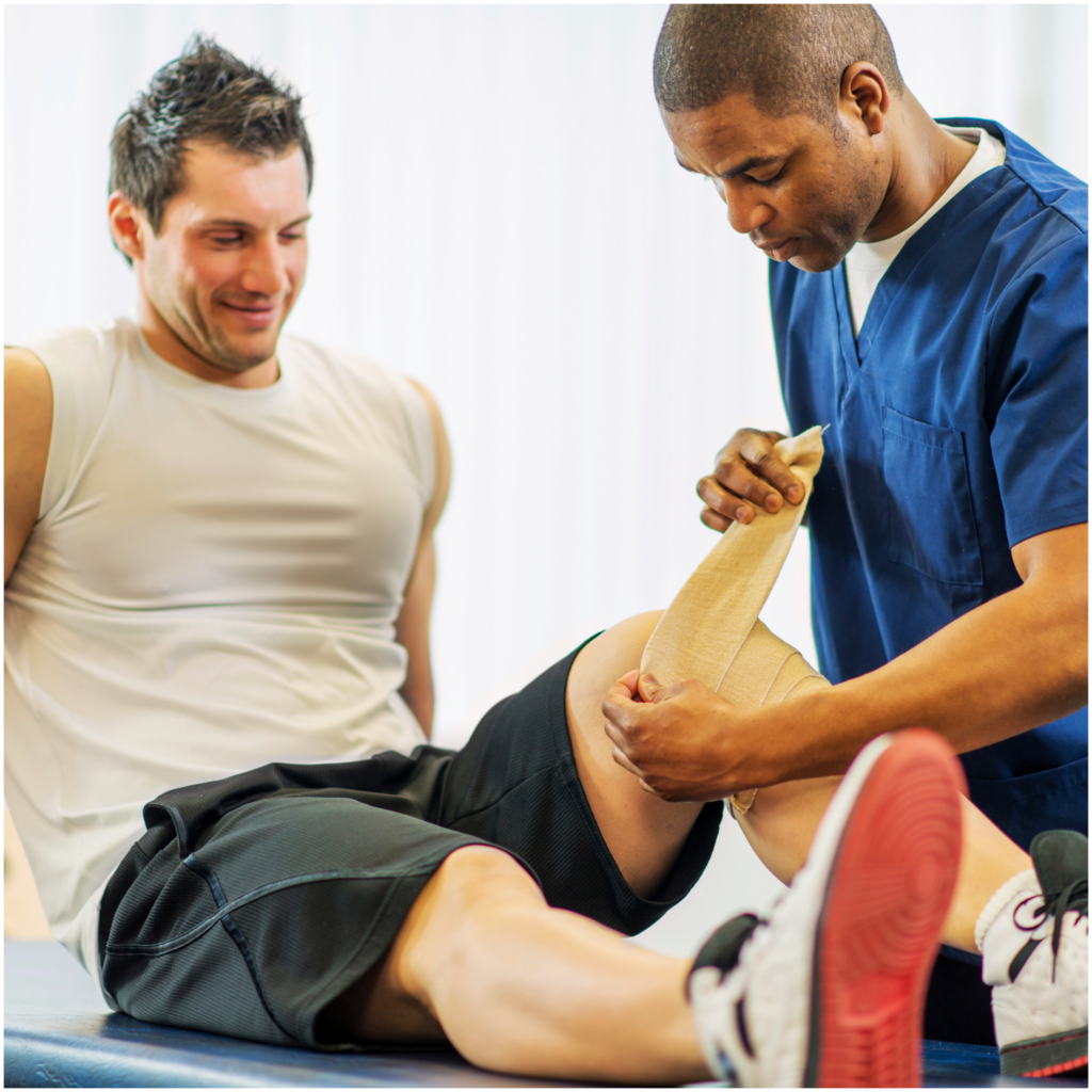 A man is getting his knee examined by a doctor