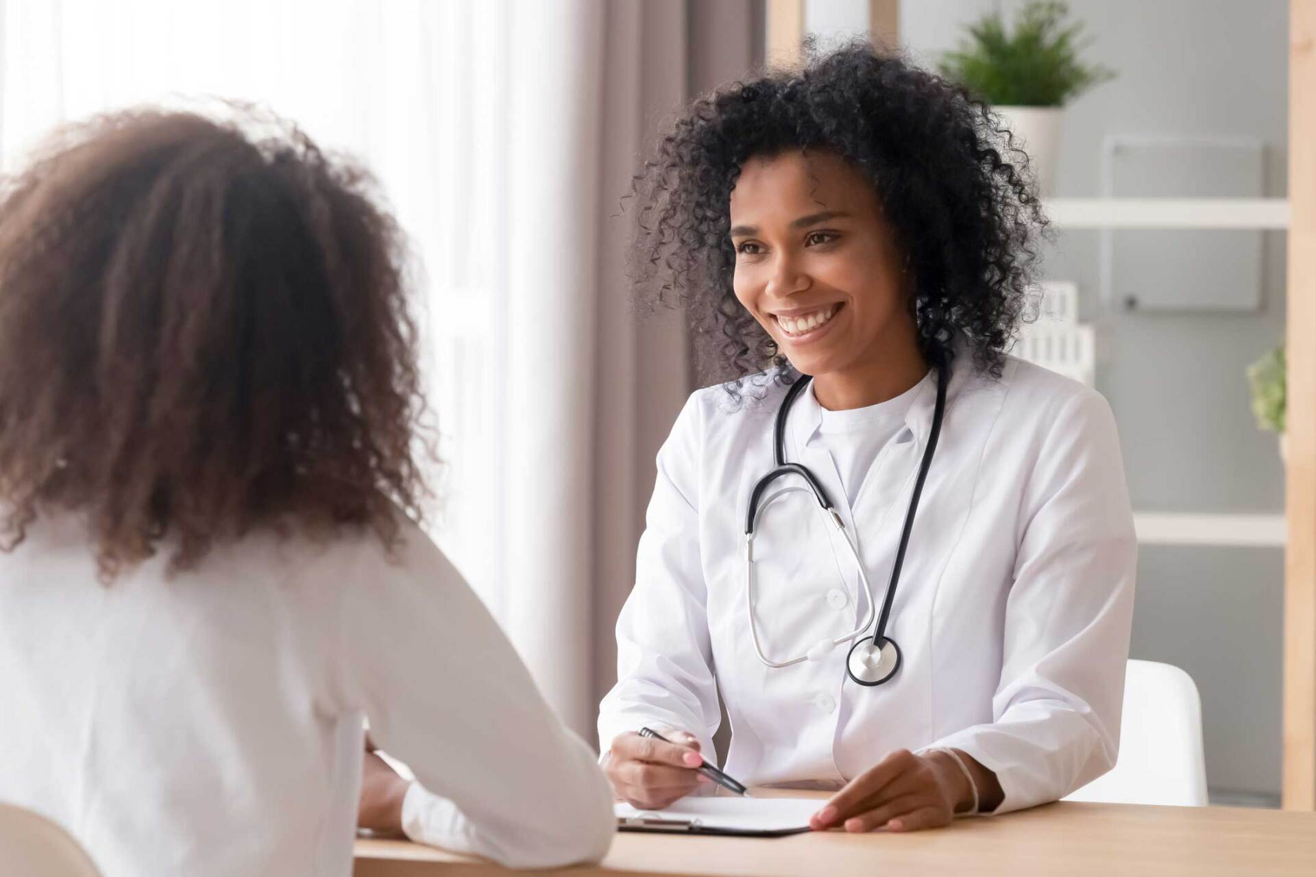 A Doctor Talking To a Patient — Dothan, AL — Wiregrass Wellness Center