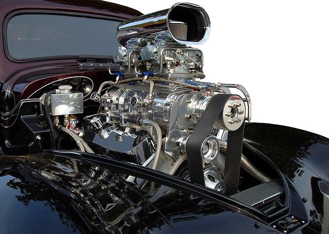 A close up of a car engine on a white background