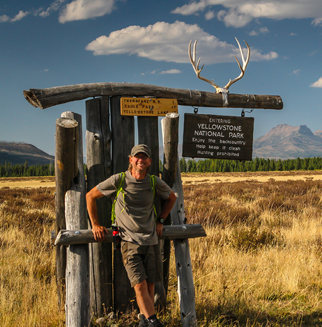 Brian Farrell, the owner of Trail Guides Yellowstone, poses for a photo in the remote Thorofare region of Yellowstone National Park.