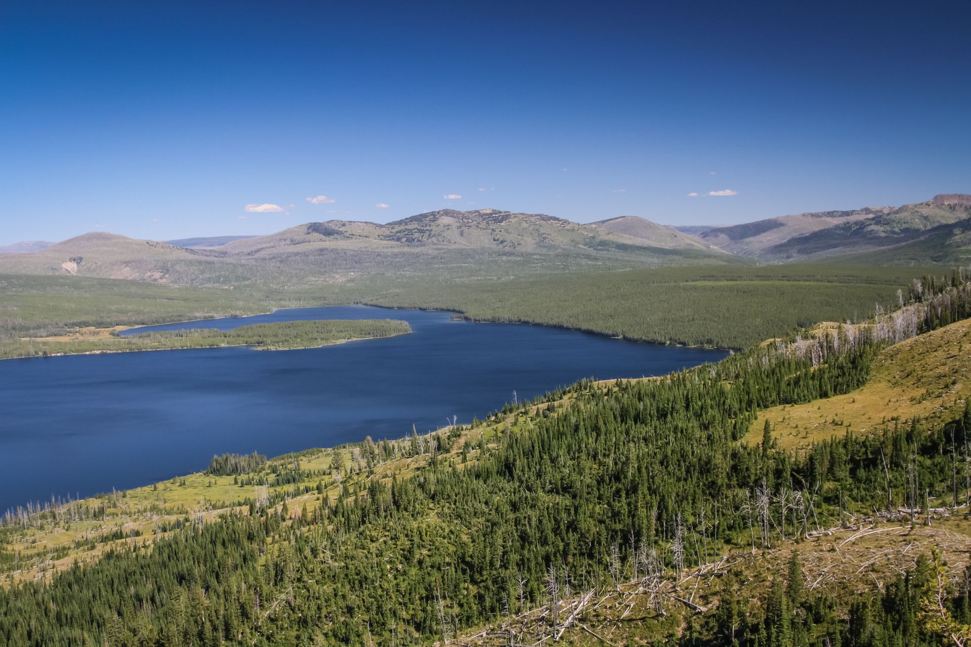 Climbing the Mount Sheridan Trail in Yellowstone gives hikers a beautiful view of Heart Lake and the surrounding wilderness.