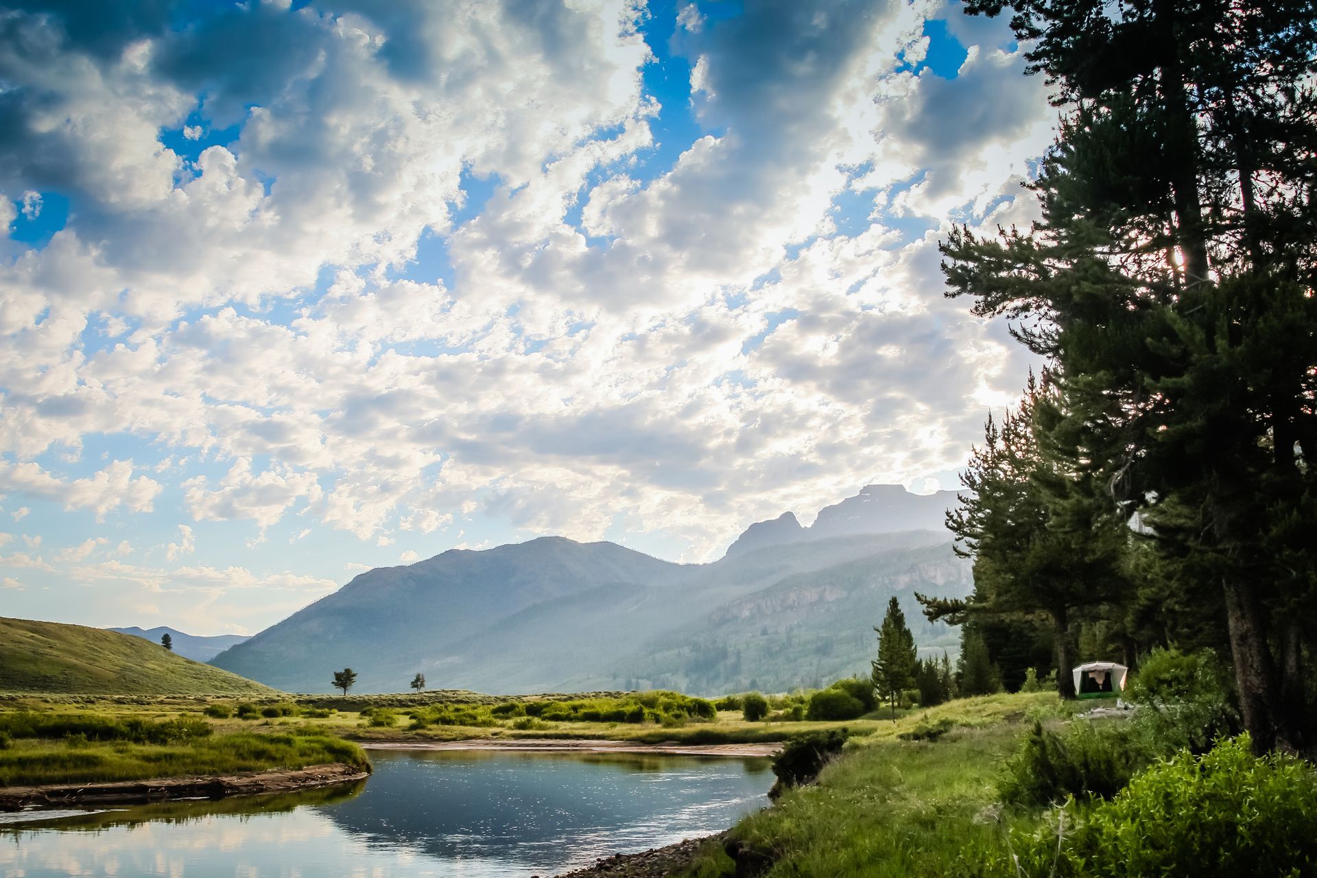 Backcountry camping beside the calm waters of Slough Creek.