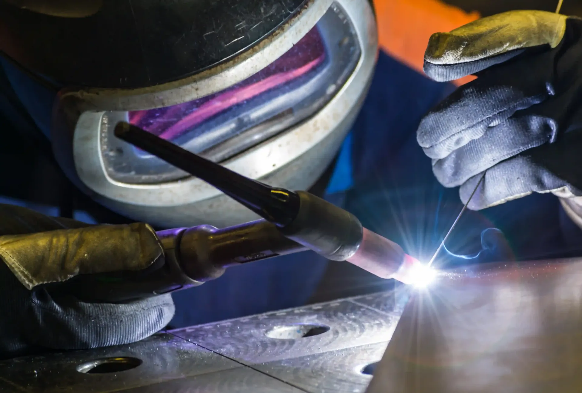 Professional TIG welder performing high-precision industrial welding services in Malaysia.
