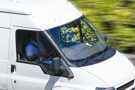 A White Commercial Van - Window Repairs and Replacement Services