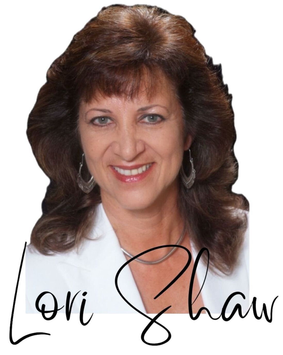 A dining room with a table and chairs and a wooden staircase.