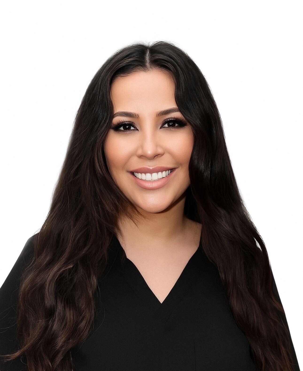 Woman with long dark hair smiles, wearing a black top.
