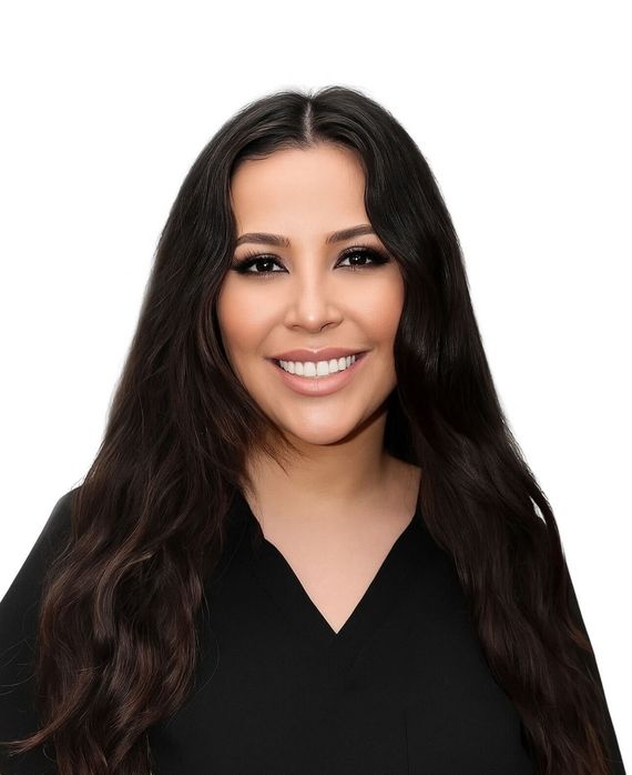 A woman in a black scrub top is smiling for the camera.
Daniela from Beyouty MedSpa
