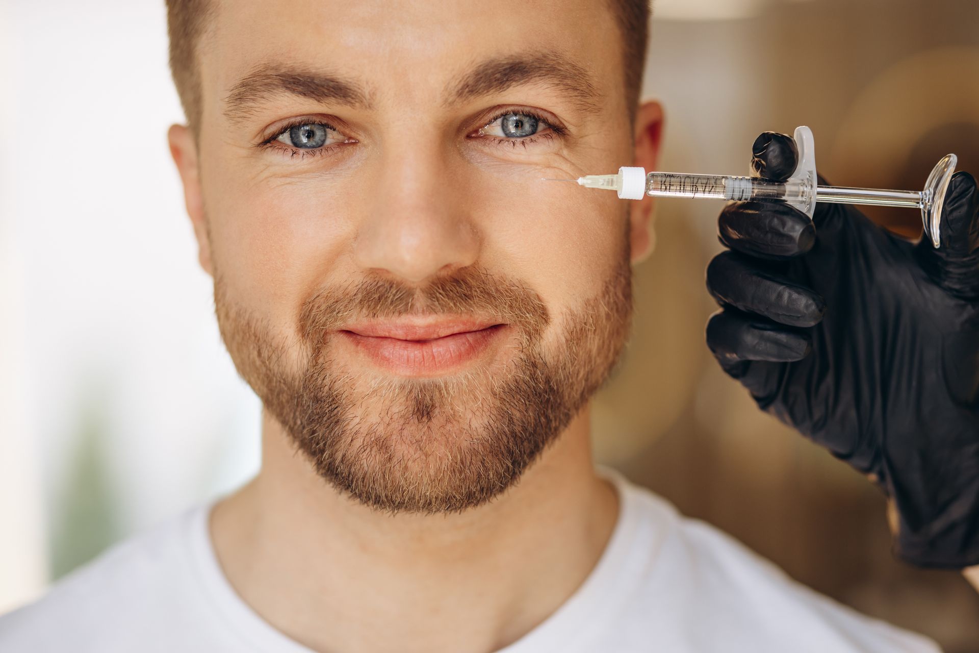 man beauty salon making injections