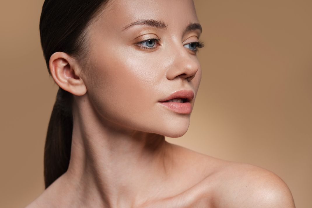 Portrait of a woman's side profile.