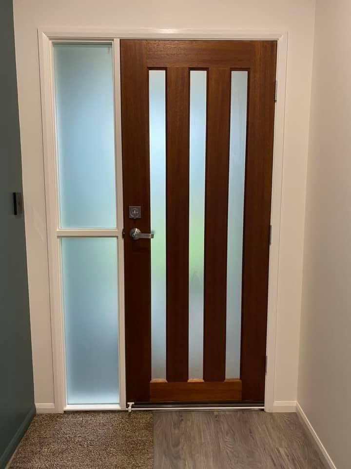 Wooden Front Door With Glass Panels and Sidelight — Wide Bay Tinting in Sharon, QLD