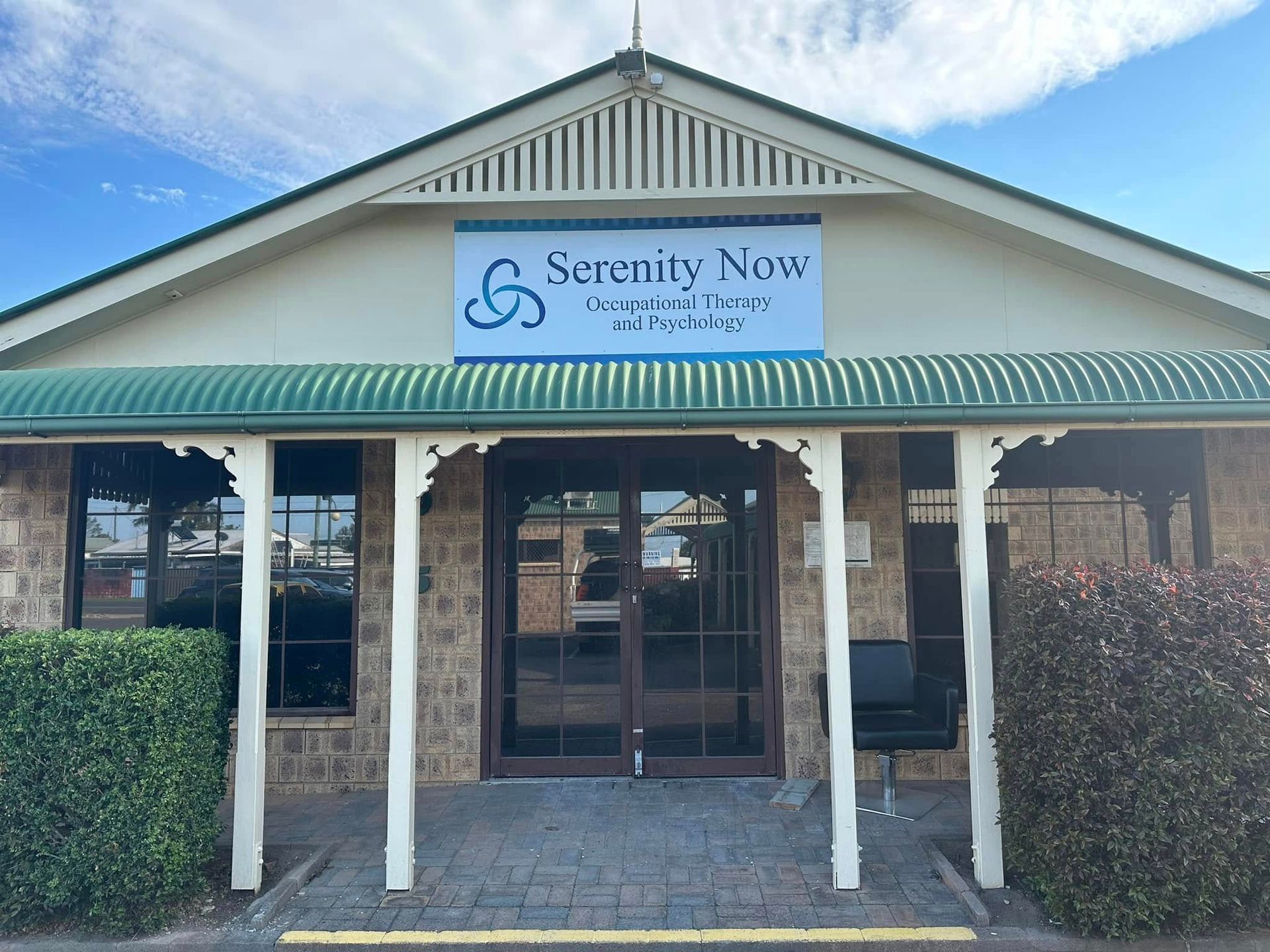 Serenity Now building with a sign above the entrance — Wide Bay Tinting in Kensington, QLD