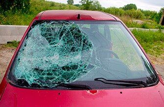 Red Car Broken Glass - Windshield Repair in Marysville, WA