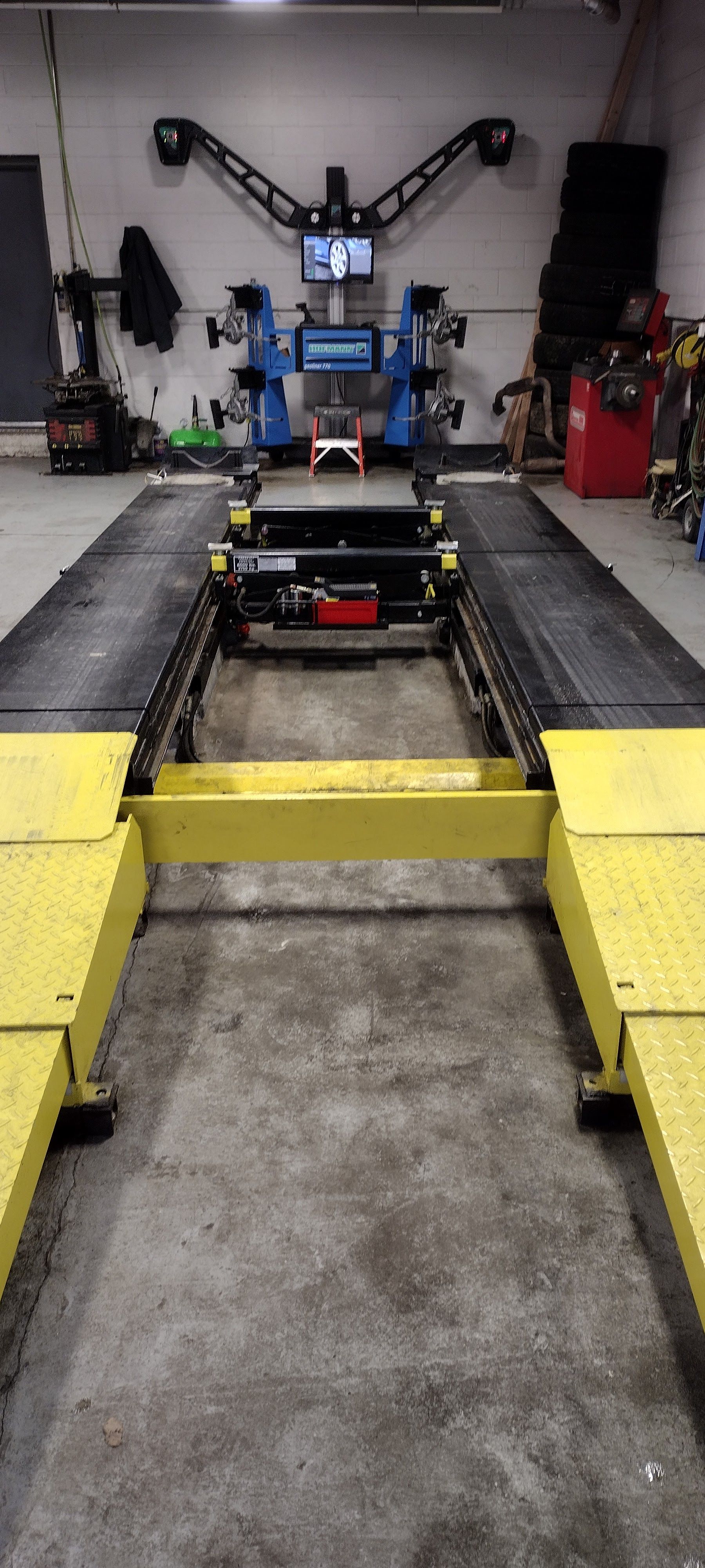 A car alignment machine in a garage | MJ Auto Repair