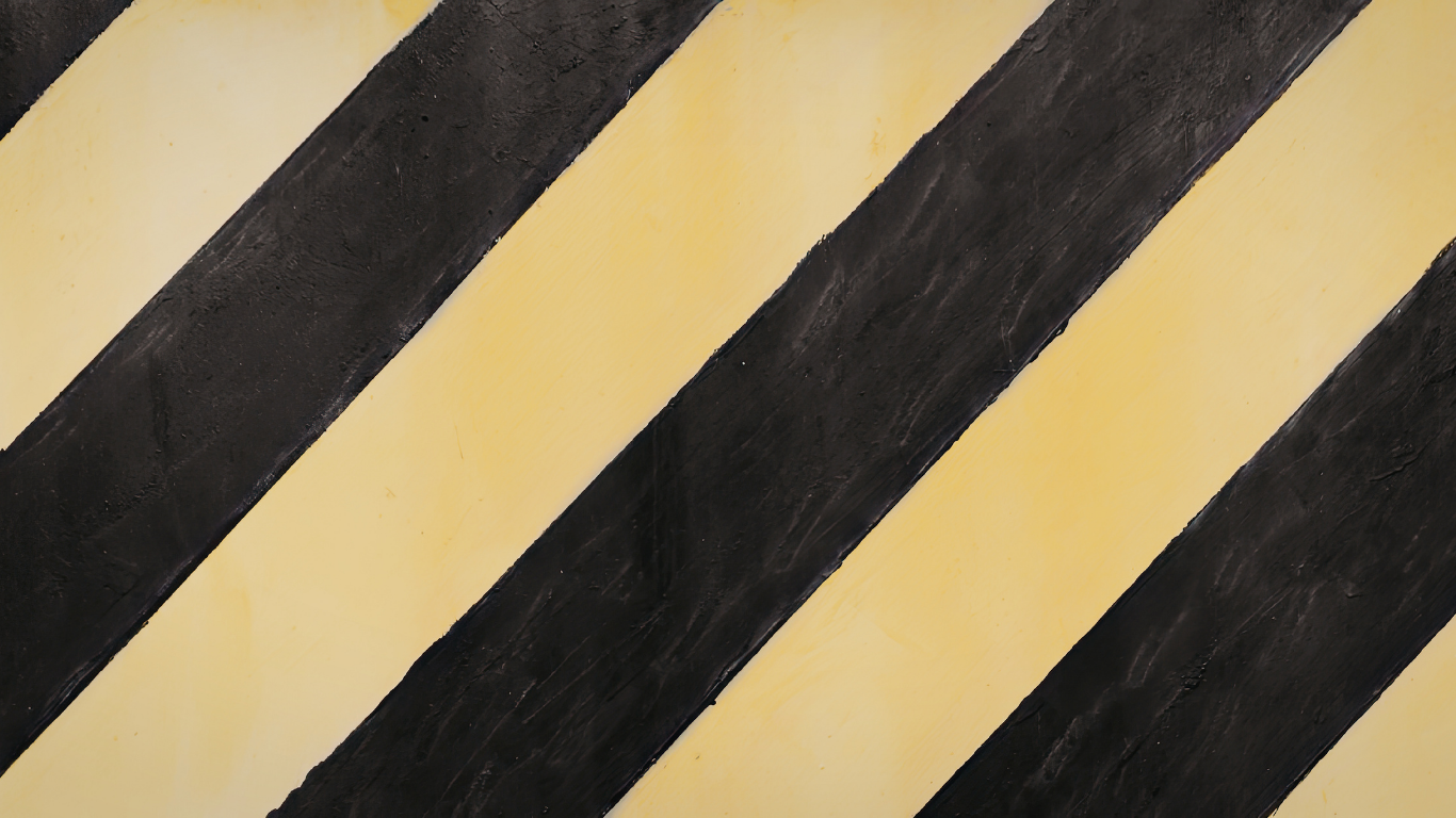 Yellow and black diagonal hazard warning stripes.