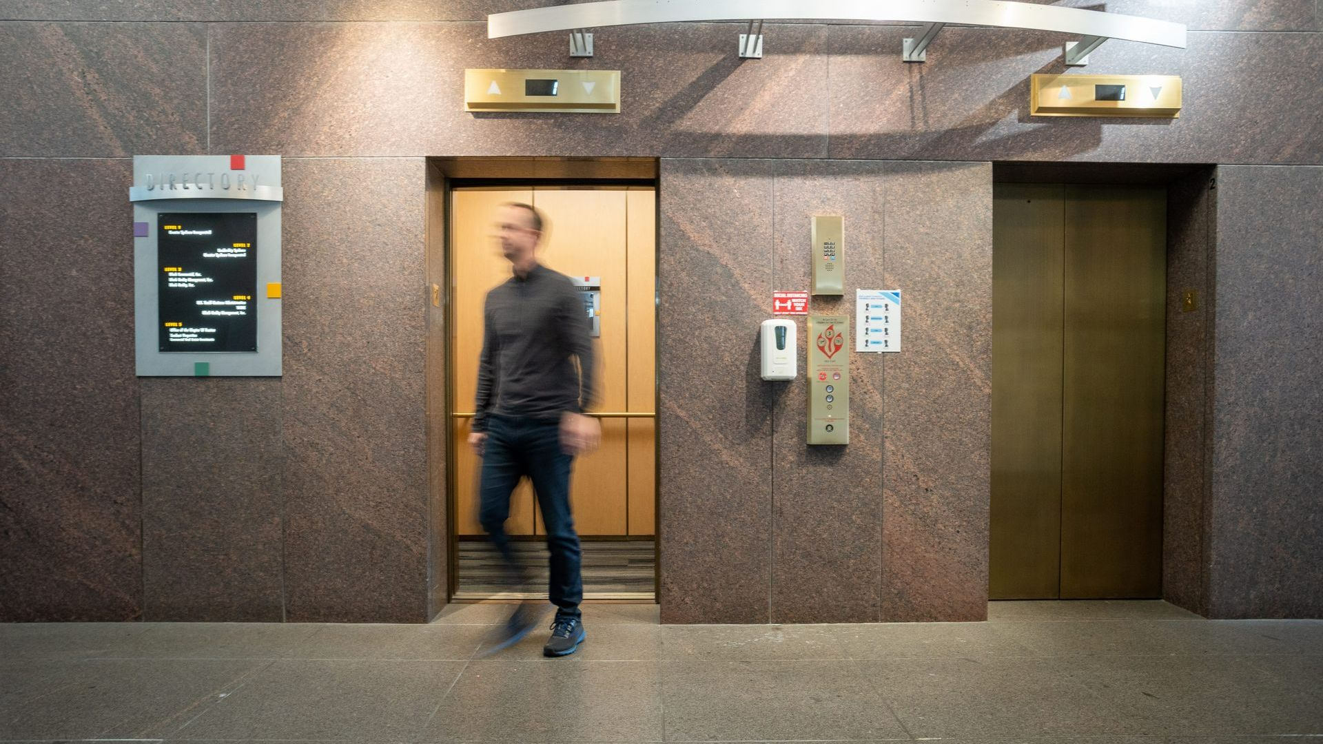Helping a Man on Wheelchair — Spokane, WA — Vertical Option Elevator Services