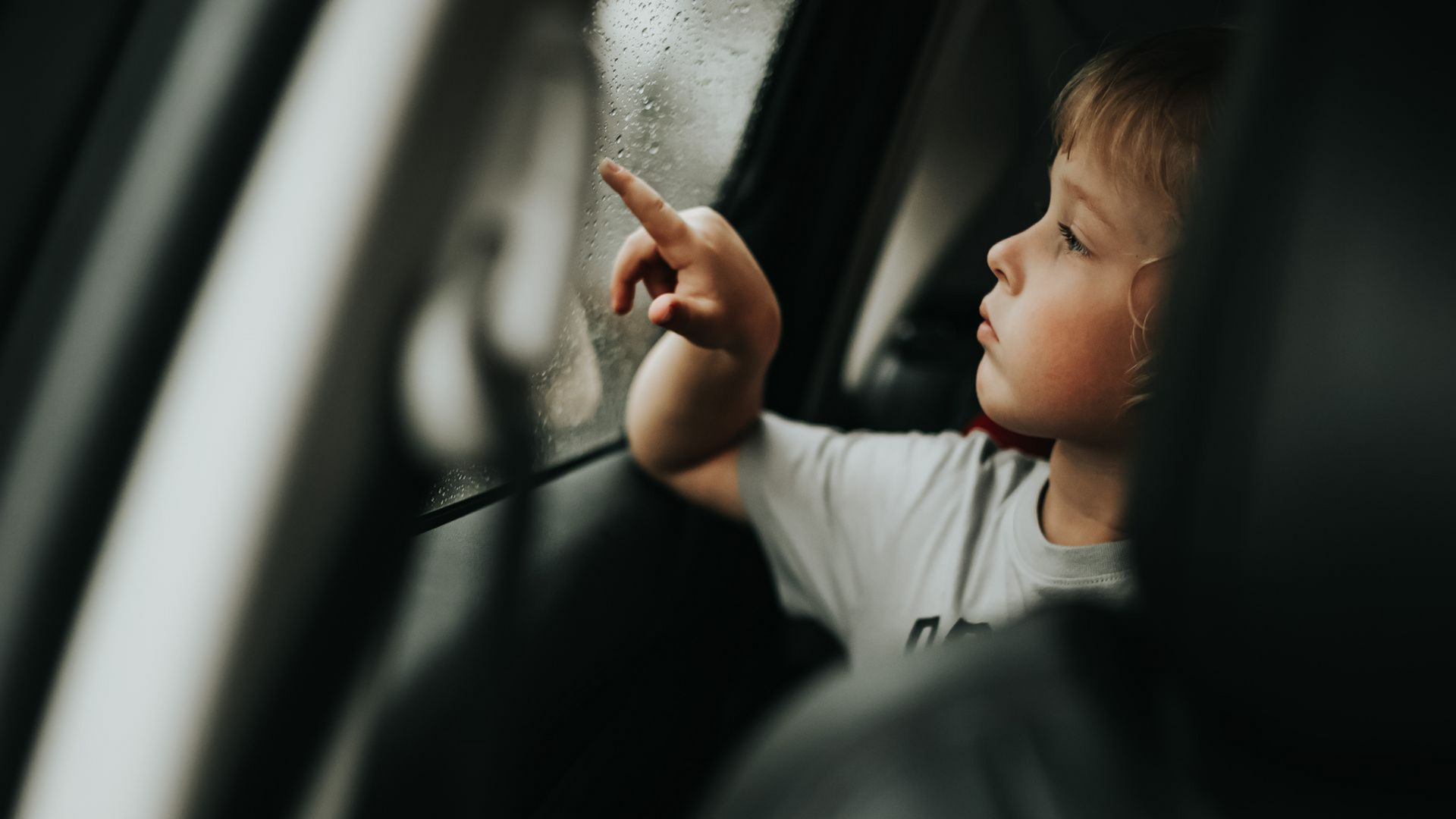 Red lit up battery symbol on a vehicle dashboard