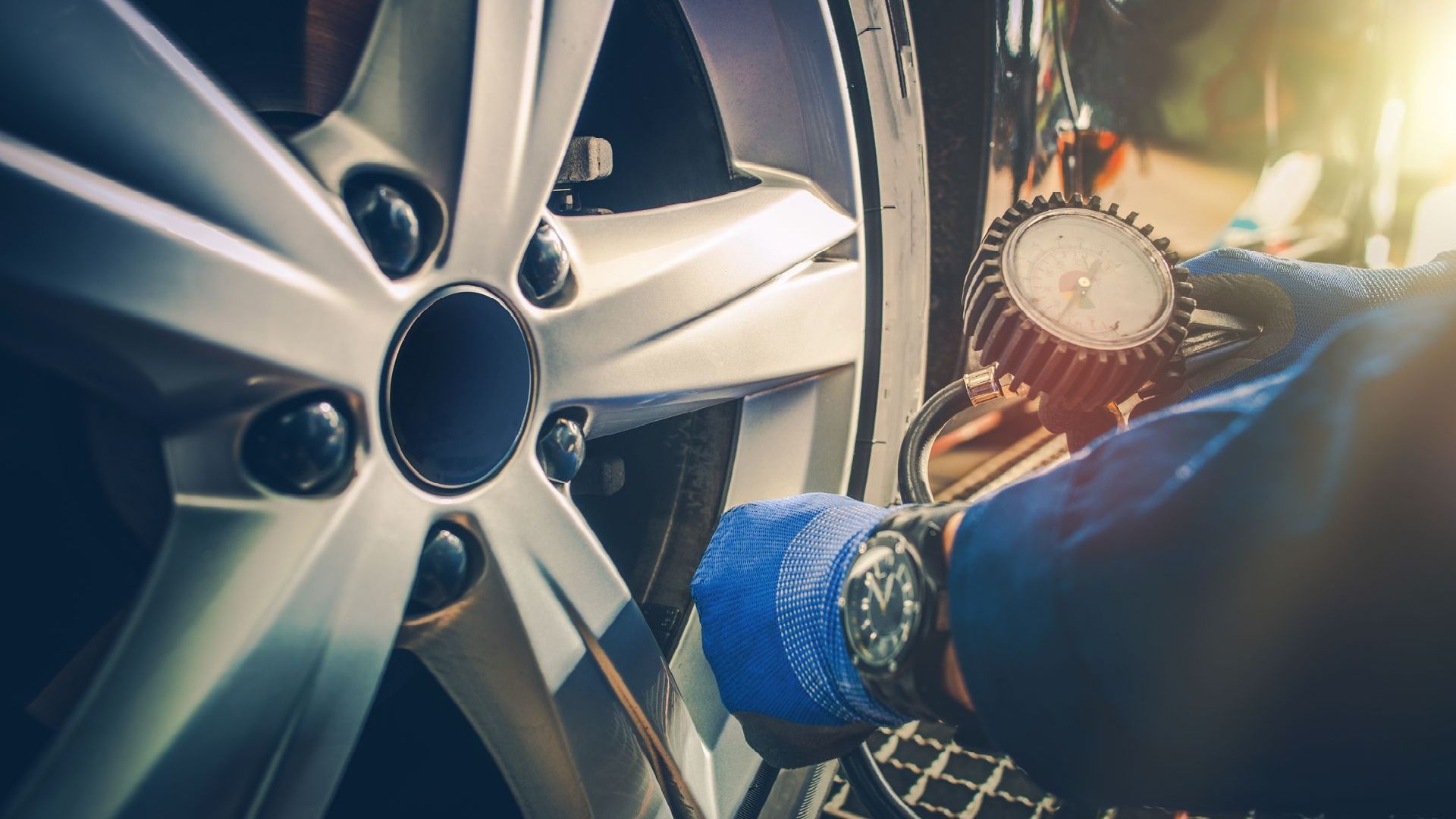 Close up of a tyre being filled up with air