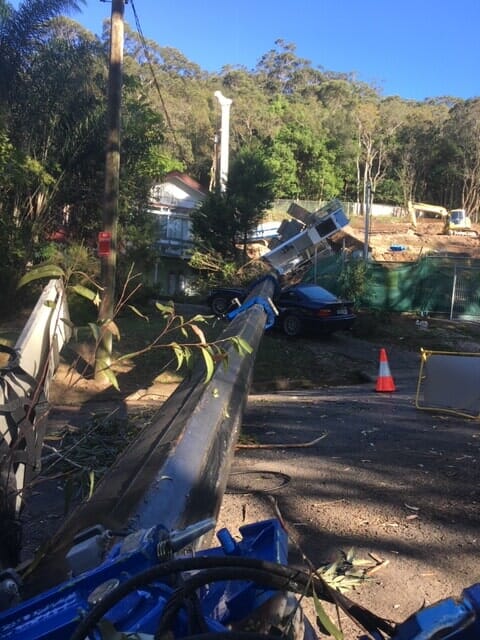 Emergency Tree Removal with Pole Fallen on Car