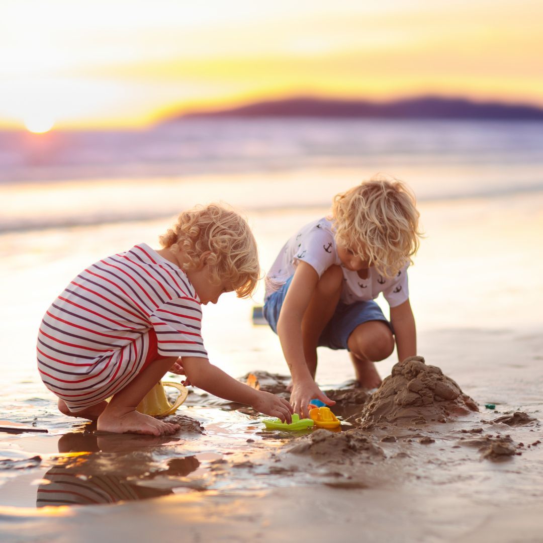 kids playing on beach